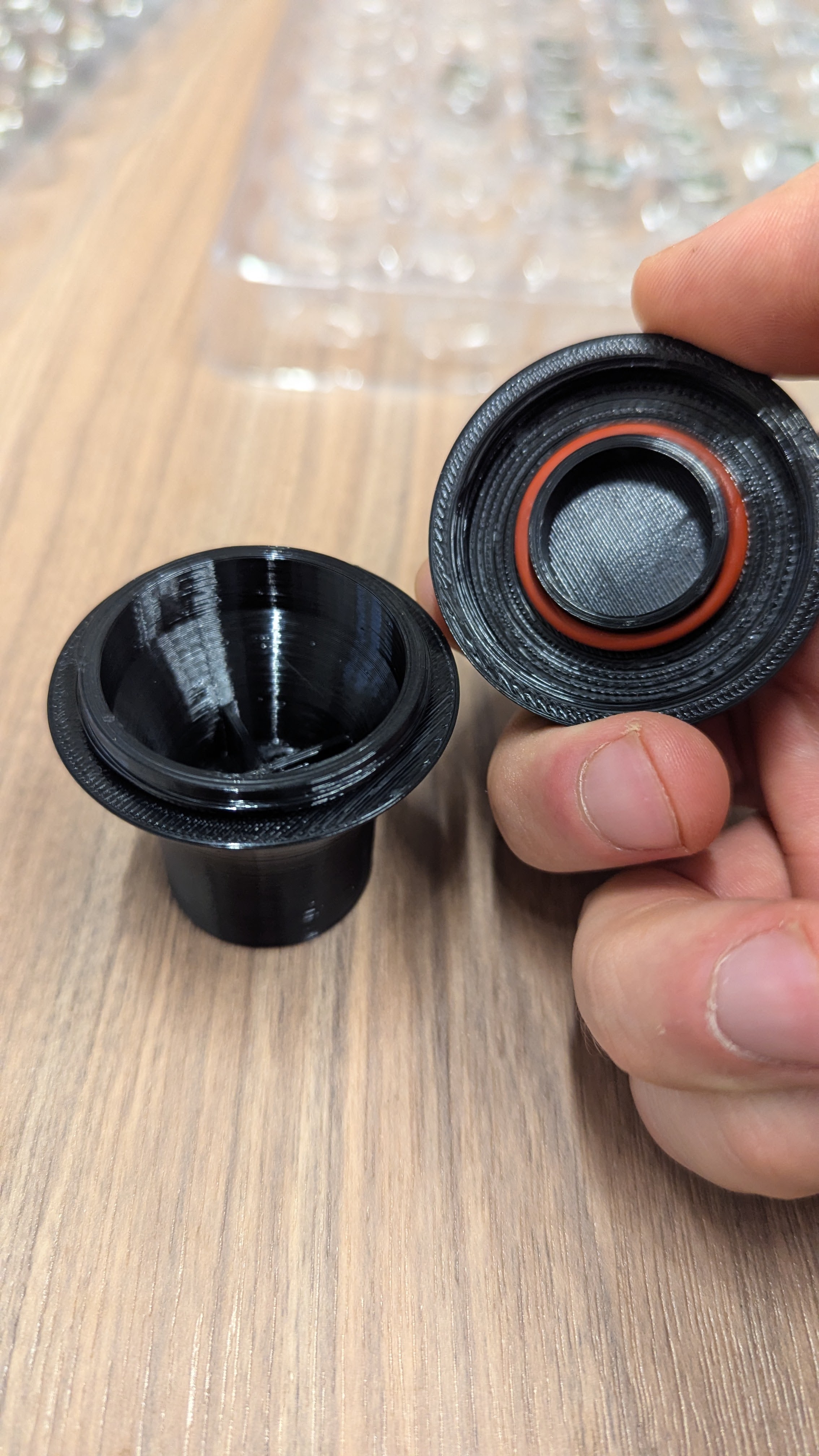 Handle top being unscrewed showing the unscrewing process